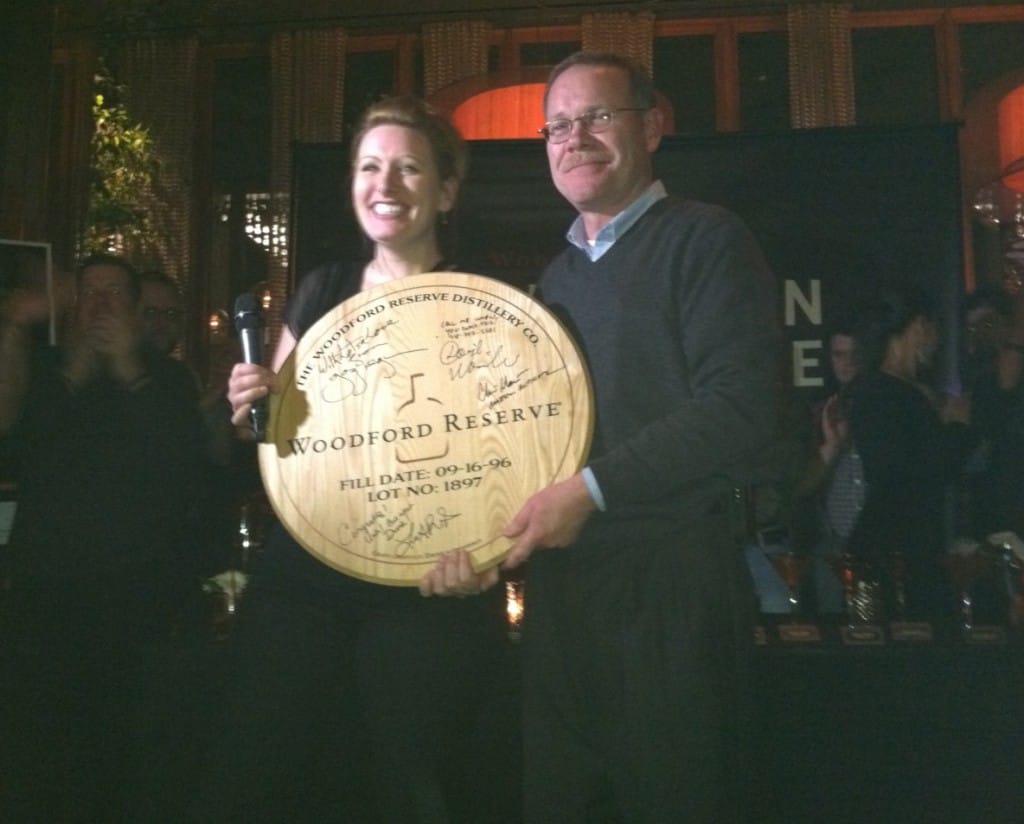 Mixologist Joanne Spiegel wins Master of the Manhattan and poses with Woodford Reserve Mixologist Chris Morris