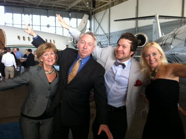 Ron Geary and his Family with BourbonBlog.com's Tom Fischer at Louisville Executive Aviation, all pretending to be jets