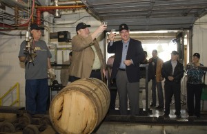 Seventh-generation Beam family distiller Fred No and Bill Newlands, president of Beam Global Spirits and Wine U.S., pull a sample of a new  Knob Creek Bourbon and toast on Barrel Dump Day