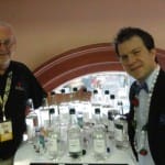 Four Roses Master Distiller Jim Rutledge and BourbonBlog.com’s Tom Fischer next to the 10 Unique Recipes of Four Roses in their “White Dog” un-aged form to sample