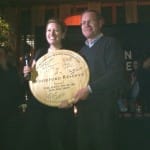 Mixologist Joanne Spiegel wins Master of the Manhattan and poses with Woodford Reserve MIxologist Chris Morris