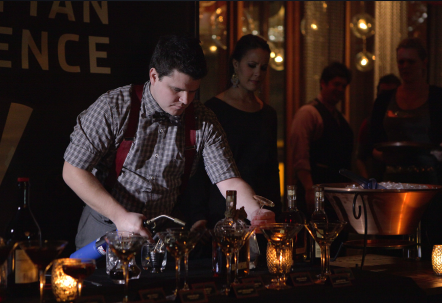 A contestant at the Woodford Reserve Manhattan Experience finale prepares his manhattan 