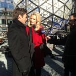 Host Ryan Seacrest and Jenny McCarthy talk in front of the Times Square Ball made of Waterford Crystals