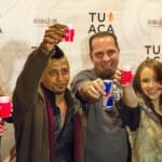 DJ Ravindrums and Corey Miller toast with TUACA at Drinks & Ink in Denver,Colorado