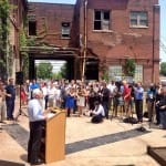 Kentucky Governor Steve Beshear addresses a crowd at Slugger Field in Louisville about the Louisville Distilling Company announcement